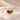 Demi Heart Necklace in gold with January garnet and August peridot pear-cut stones forming a heart