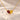 Demi Heart Necklace in gold with January garnet and November topaz pear-cut stones forming a heart