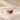 Demi Heart Necklace in gold with February amethyst and January garnet pear-cut stones forming a heart