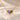 Demi Heart Necklace in gold with February amethyst and August peridot pear-cut stones forming a heart