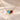 Demi Heart Necklace in gold with March aquamarine and January garnet pear-cut stones forming a heart
