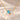 Demi Heart Necklace in gold with March aquamarine and April diamond pear-cut stones forming a heart