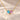 Demi Heart Necklace in gold with March aquamarine and October pink tourmaline pear-cut stones forming a heart
