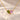 Demi Heart Necklace in gold with August peridot and October pink tourmaline pear-cut stones forming a heart