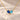 Demi Heart Necklace in gold with September sapphire and March aquamarine pear-cut stones forming a heart
